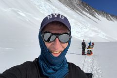07A Jerome Ryan Taking A Rest Break With Roche Glacier Behind On The Climb From Mount Vinson Base Camp To Low Camp.jpg